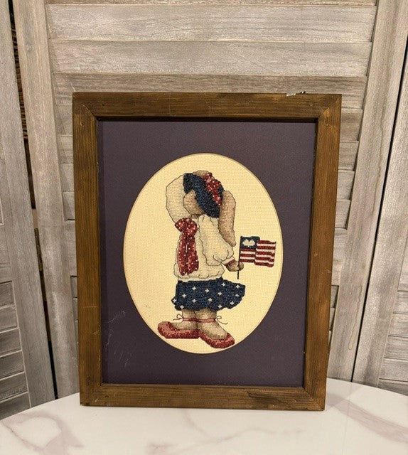 Framed Patriotic Girl Bunny Cross-Stitch – Americana Folk Art with Rustic Frame