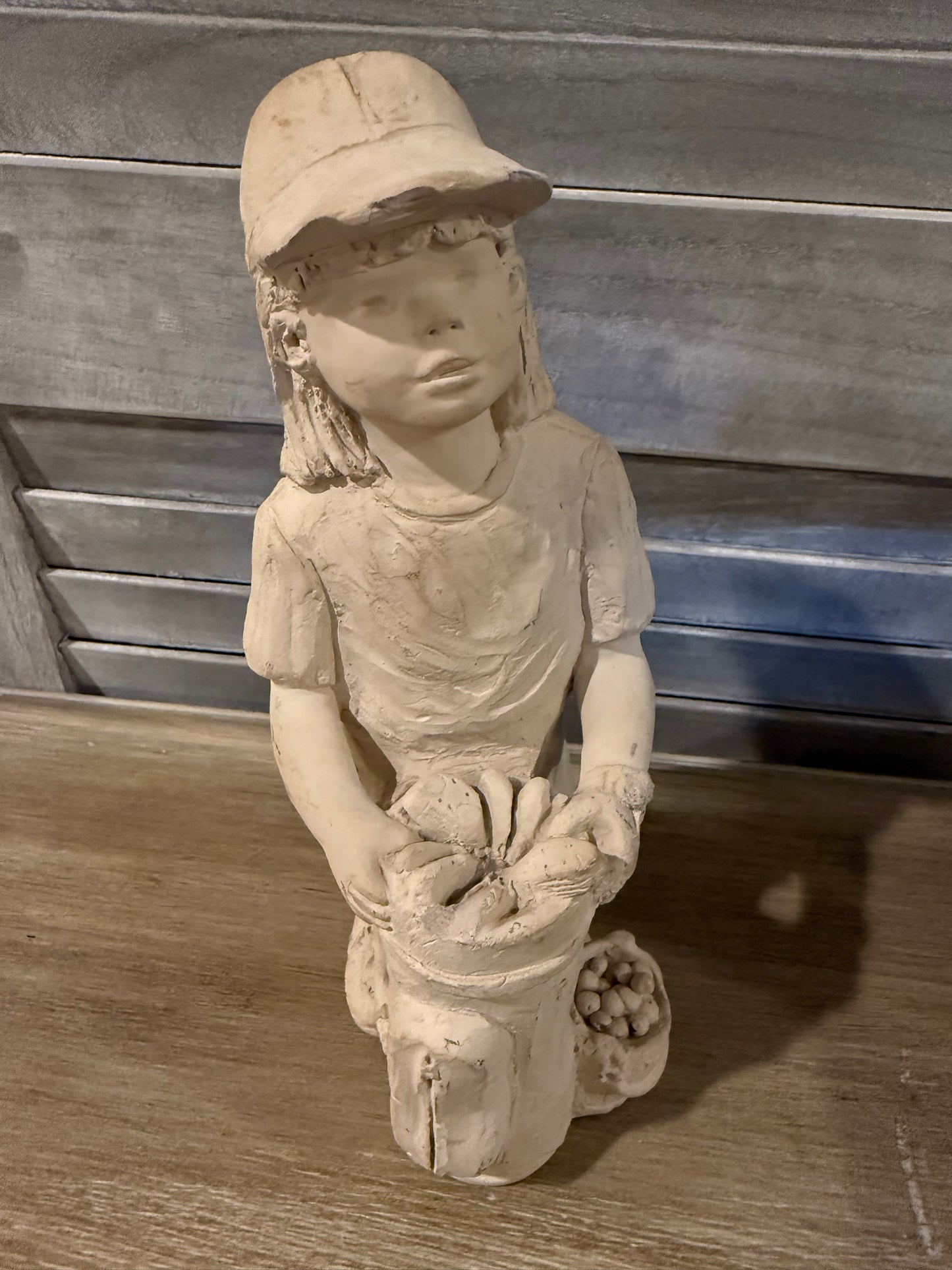 Vintage-Style Golf Girl Statue – Rustic Clay Figurine with Golf Bag Detail